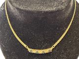 a close up of a necklace on a mannequin mannequin mannequin mannequin mannequin mannequin mannequin mannequin