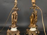 pair of antique brass candlesticks with figures on marble bases