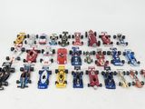 a lot of toy cars that are sitting on a table