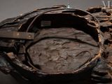 a close up of a piece of metal with rust on it