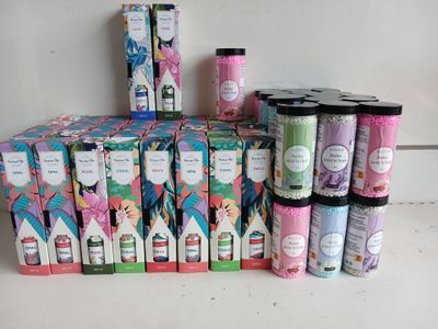 many different types of soaps and lotions on the counter