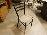 a chair that is sitting in the middle of a room