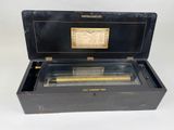 a black box with a musical instrument inside of it