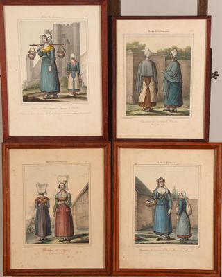 four framed pictures of people in medieval clothing standing in front of a wall