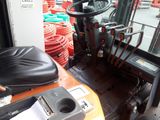 an image of a forklift driver ' s seat and steering