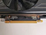 a close up of a video card with a fan on it