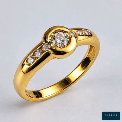 une photo d'une bague en or sertie de diamants