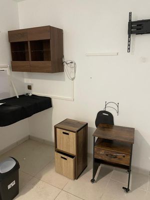 a bathroom with a sink and a cabinet in it