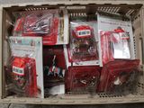 a box full of assorted toys in it on the floor