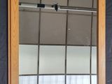 a mirror hanging on the wall in a room