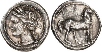 a silver coin with an image of a woman and a horse on it