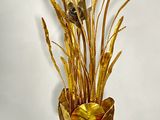 a vase that has some flowers in it on a table