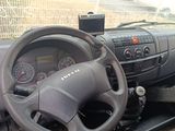 dashboard view of a car with a steering wheel and dashboard controls