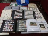 a table that has a bunch of stamps on it