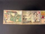 four panels of asian paintings on display on a black surface