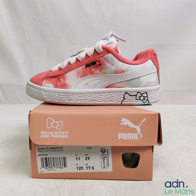 a close up of a pair of shoes on top of a box