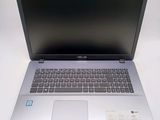 an image of a laptop computer sitting on top of a white table