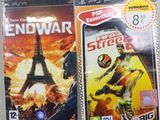 two video games on the table next to each other