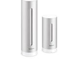 two white air purifiers sitting next to each other on a white surface