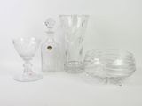 a lot of glass items that are sitting on a table