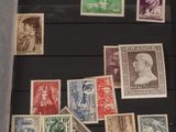 several different types of stamps are displayed in a display case