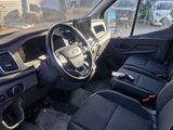 a view of the inside of a van from the driver ' s seat