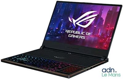 the asus republic of gamer laptop is open and ready to use