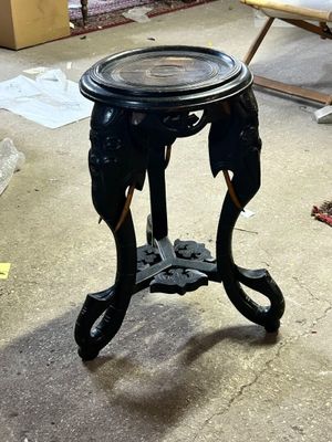 an image of a table made out of an elephant ' s head