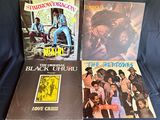 three vinyl albums of various black and white music