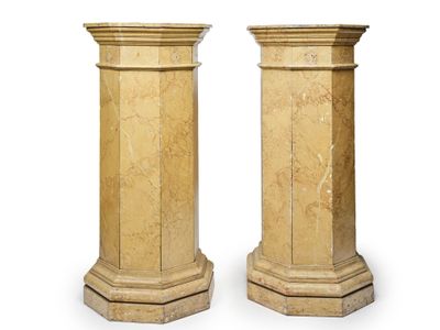 pair of marble pedestals on a white background with a white background