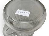a clear glass bowl with a label on it