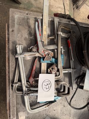 a picture of a bunch of tools sitting on top of a table