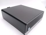 an image of a black desktop computer sitting on top of a white surface
