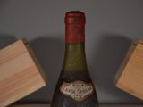 a bottle of wine that is sitting on a table