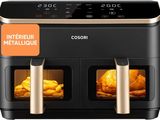 an image of a black and gold air fryer with food in it