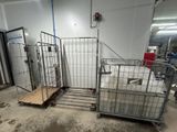 two cages that are in the middle of a room