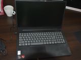 a laptop computer sitting on a desk next to a mouse