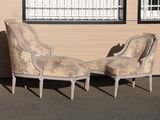 two chairs that are sitting next to each other