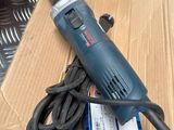a corded drill on a cardboard box on a table