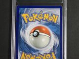 a close up of a pokemon card on a table