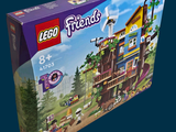 a box of lego friends sets on a blue background