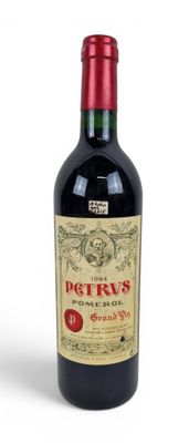 a bottle of wine that is sitting on a table
