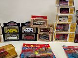 many different types of toy cars and trucks on the table
