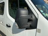 an image of a white van parked on the side of the road