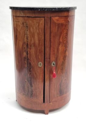 an image of a small wooden cabinet with a marble top