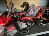 a box of tools on a table with a box in the background