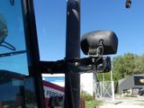 an image of a view of a bus from the driver ' s seat