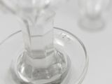 a close up of a glass of wine on a table