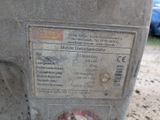 a close up of a parking meter on the side of the road