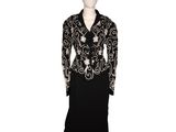 a black and white dress and jacket on a mannequin mannequin mannequin mannequin mannequin mannequin mannequin manne